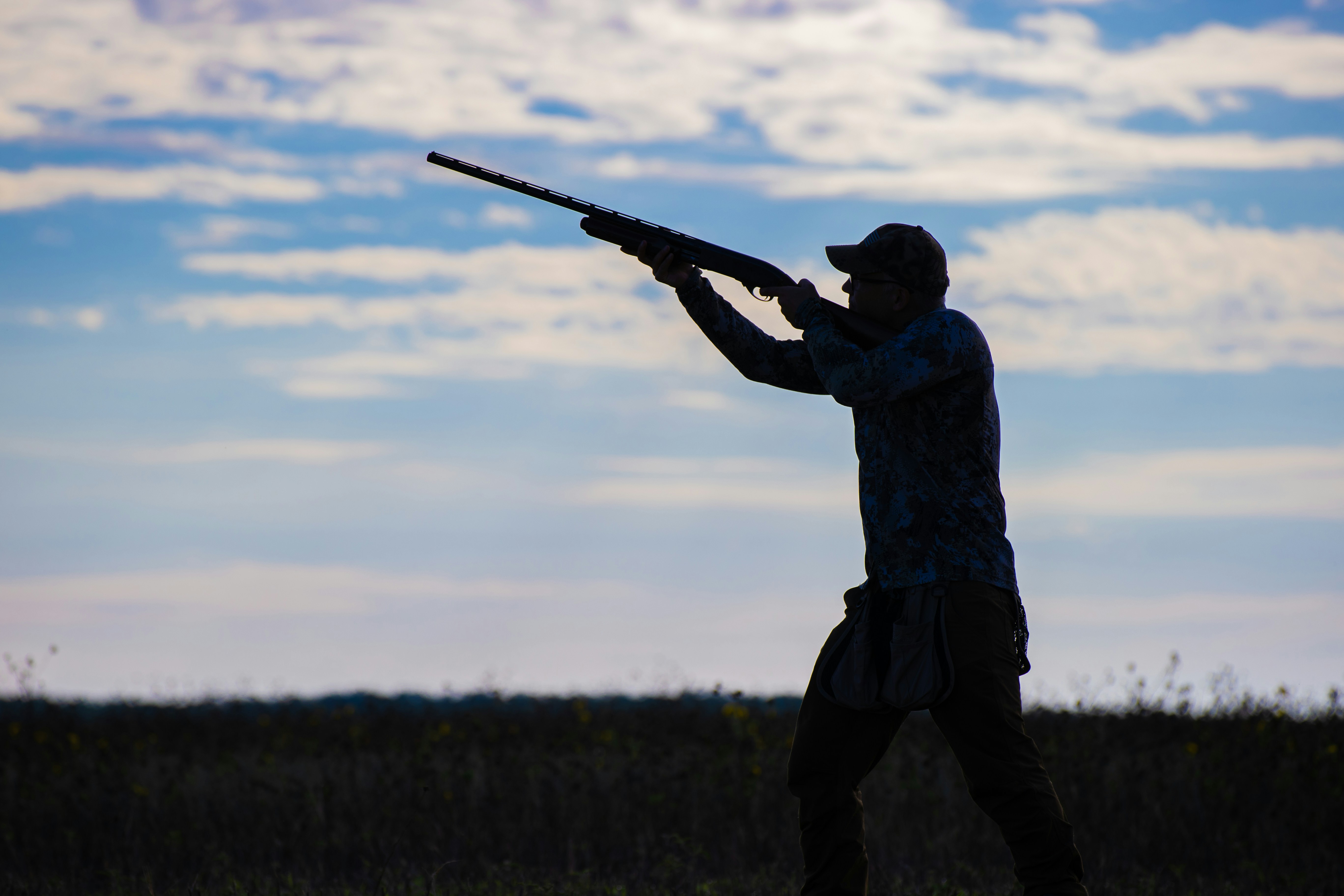 How did early humans make hunting clubs?